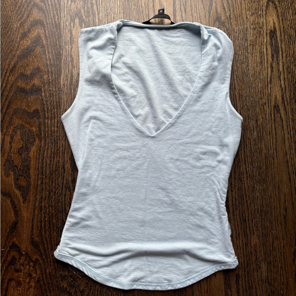 Size medium light blue top, vintage. Brand is Guess collection